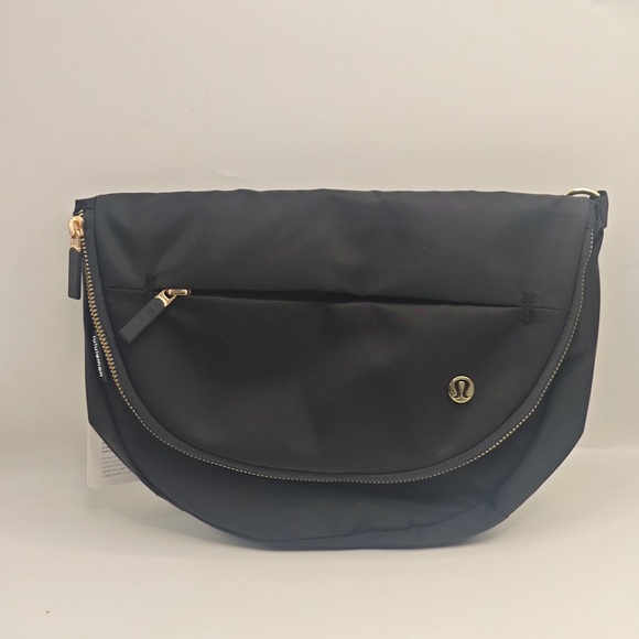 lululemon athletica Handbags - lululemon athletica Black Crescent Zip Crossbody with Gold Hardware - 5L